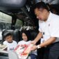 Direktur Utama Telkom Ririek Adriansyah saat Seremoni pelepasan keberangkatan para peserta Mudik Bersama BUMN 2025 di Gelora Bung Karno (GBK), Jakarta, pada Kamis (27/3).