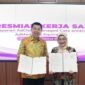 CEO Equira Life Elvis Liongosari (kiri) dan CEO AdMedika Dian Prambini (kanan) saat acara penandatanganan kerja sama layanan AdClaim Managed Care antara Admedika & Equira Life.
