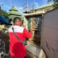 Tim Telkom Akses yang melakukan pemulihan jaringan di wilayah yang terdampak banjir dan tanah longsor di Sumatera.