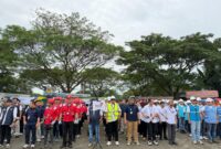 Apel kesiapan Relawan BUMN Peduli di area Bandara Kualanamu, Sumatra Utara, Jumat (19/12).