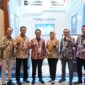 Direktur IT Digital Telkom Faizal Rochmad Djoemadi (ketiga dari kiri) bersama jajaran TelkomGroup di booth Telkom Solution dalam ajang Festival Ekonomi Keuangan Digital Indonesia (FEKDI) & Indonesia Fintech Summit & Expo (IFSE) 2026 di Jakarta International Convention Center (JICC), Jakarta. Melalui kolaborasi dengan Danantara Indonesia, Telkom Solution menghadirkan kapabilitas dan solusi digital terintegrasi untuk mendukung penguatan ekosistem ekonomi dan keuangan digital Indonesia yang semakin inklusif, aman, dan berdaya saing.