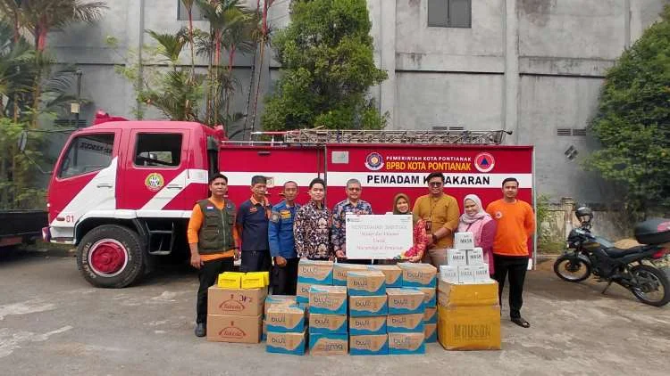 TelkomGroup berikan bantuan korban karhulta di Kalimantan. (Dok Telkom)